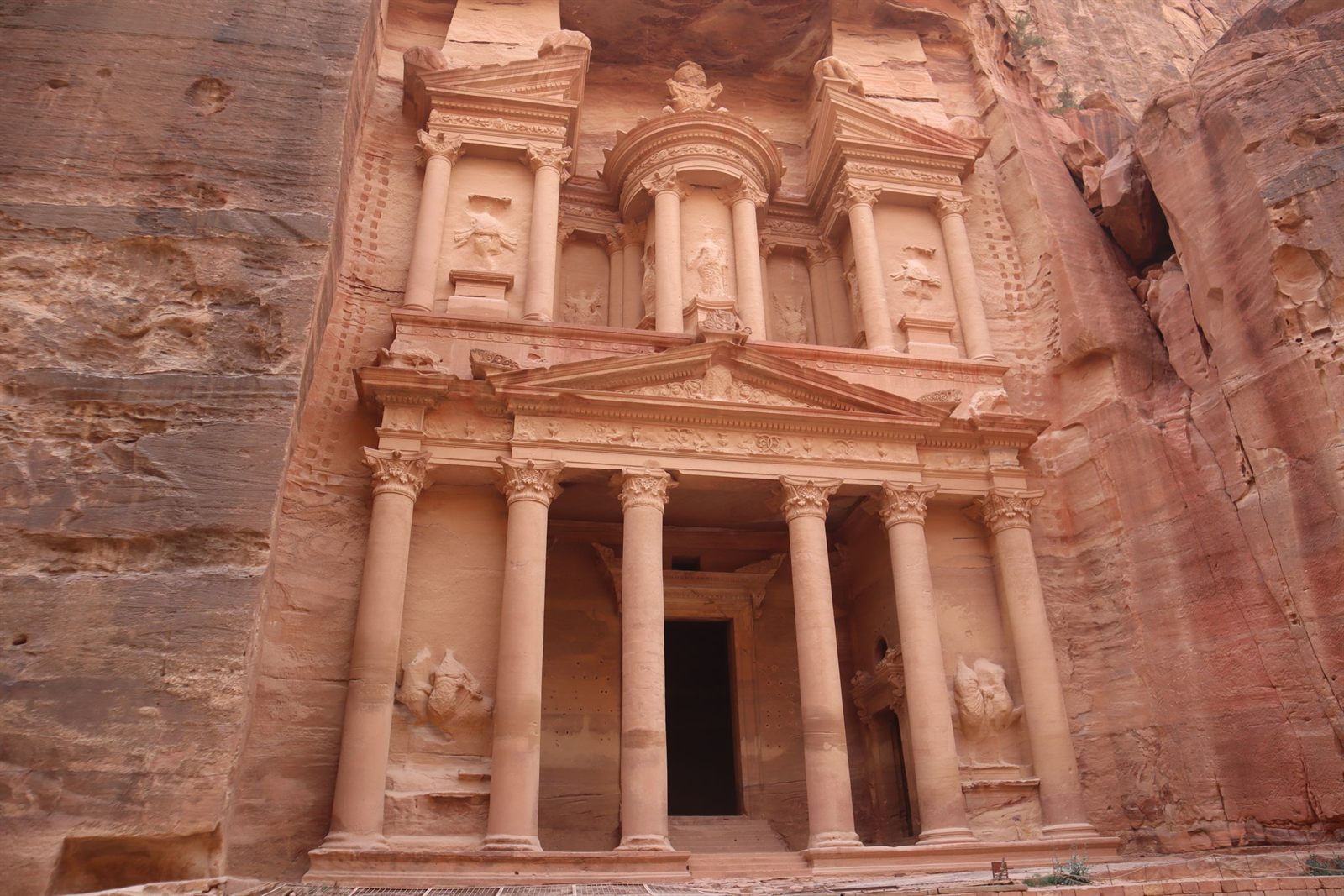 The rose-red Treasury facade carved into the rock at Petra