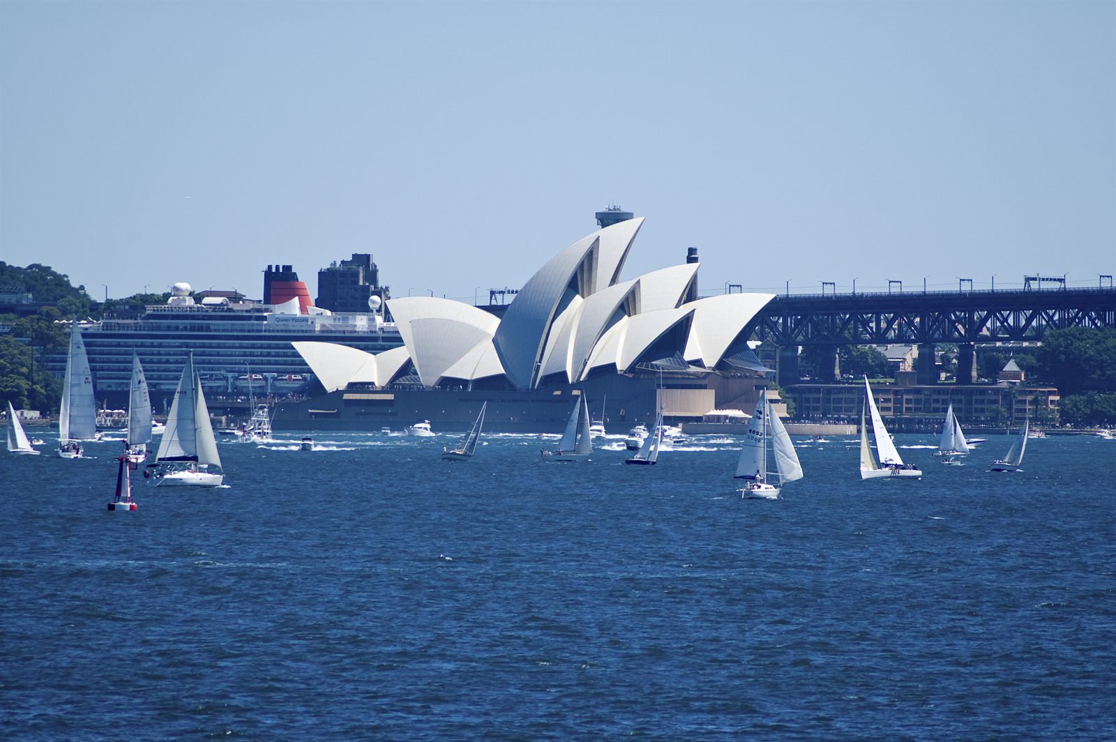 Sailboats on Sydney Harbour in front of the Opera House and Harbour Bridge